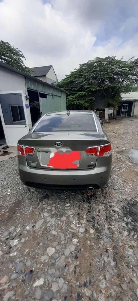 Kia Forte 2011 - Bán Kia Forte sản xuất năm 2011, màu xám, bao zin
