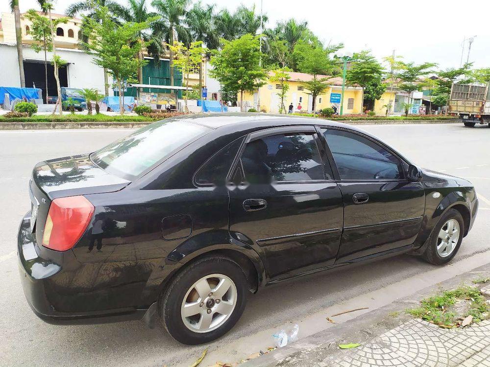 Daewoo Lacetti EX 2005 - Nhà bán Daewoo Lacetti EX đời 2005, màu đen số sàn