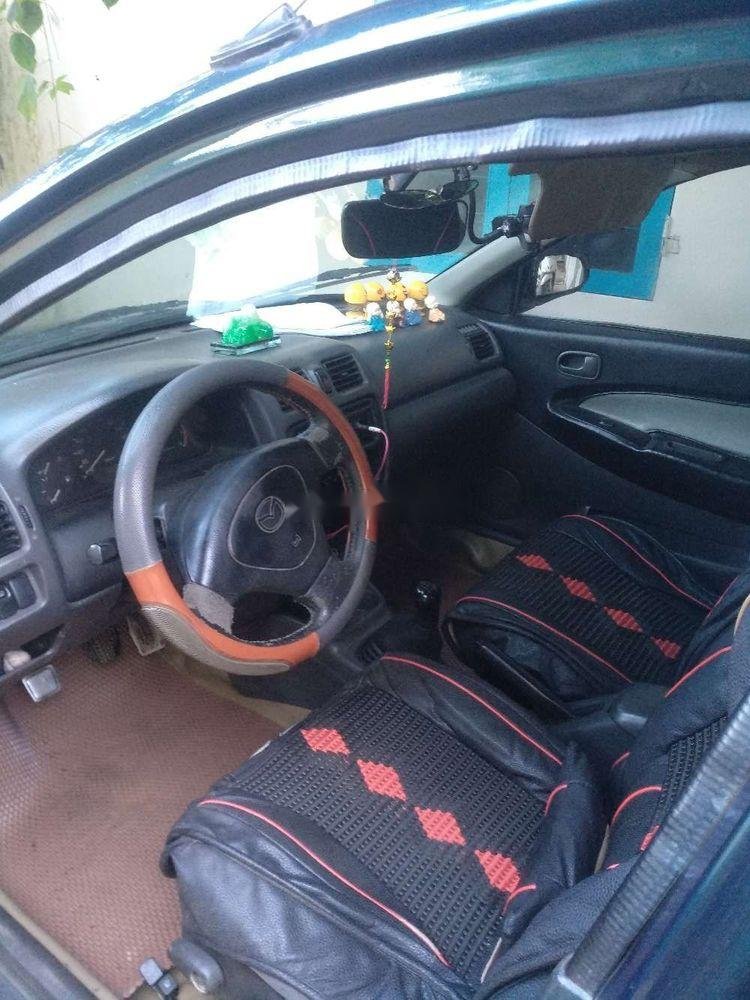 Mazda 323   2000 - Bán ô tô Mazda 323 năm sản xuất 2000, màu xanh