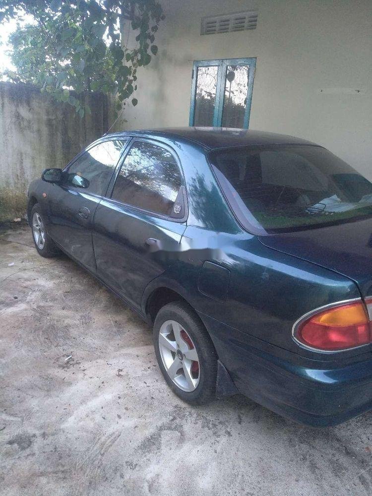 Mazda 323   2000 - Bán ô tô Mazda 323 năm sản xuất 2000, màu xanh