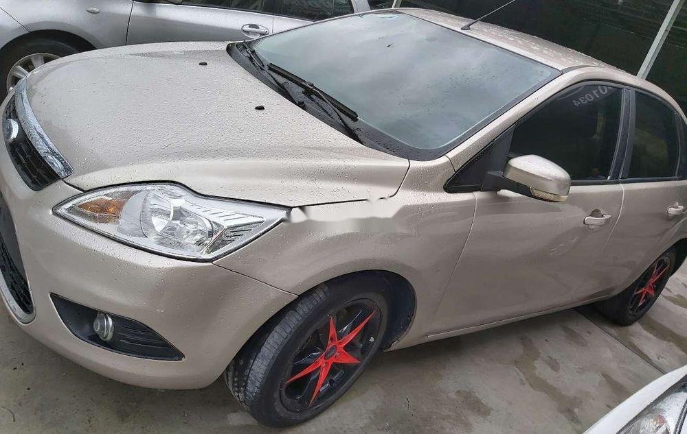 Ford Focus 2011 - Cần bán lại xe Ford Focus bản 1.8MT sx 2011, màu vàng, giá tốt