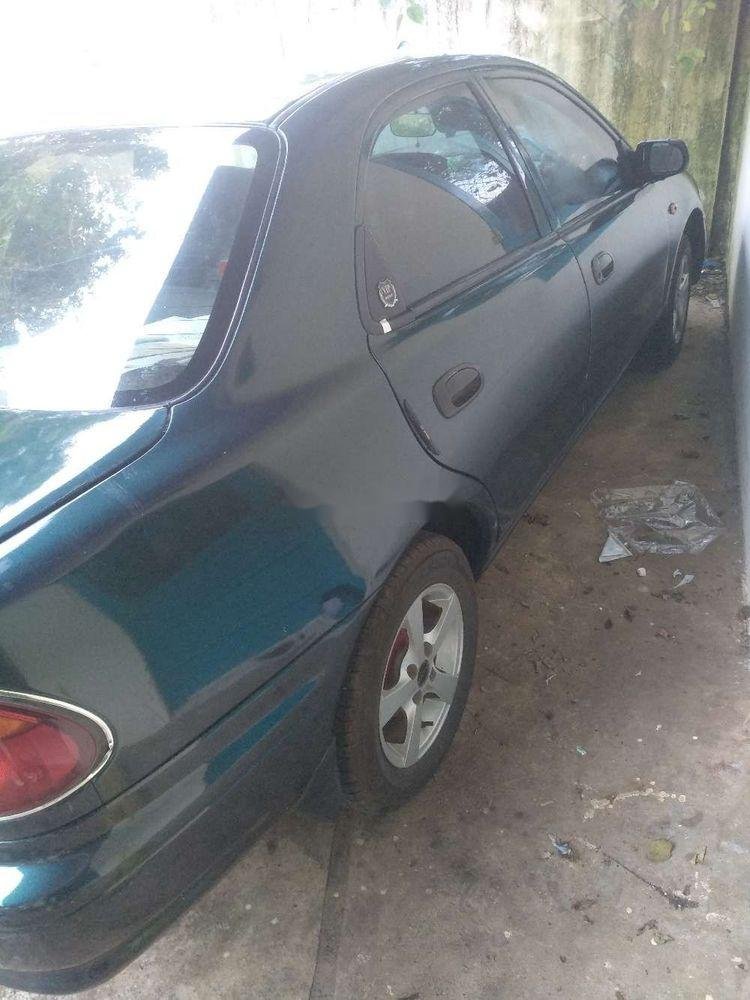 Mazda 323   2000 - Bán ô tô Mazda 323 năm sản xuất 2000, màu xanh