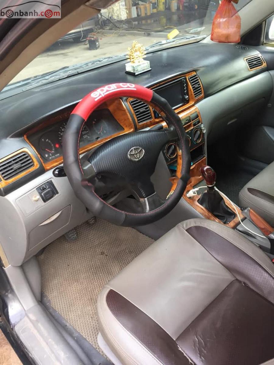 Toyota Corolla   2003 - Bán Toyota Corolla J 1.3 MT năm sản xuất 2003, màu đen