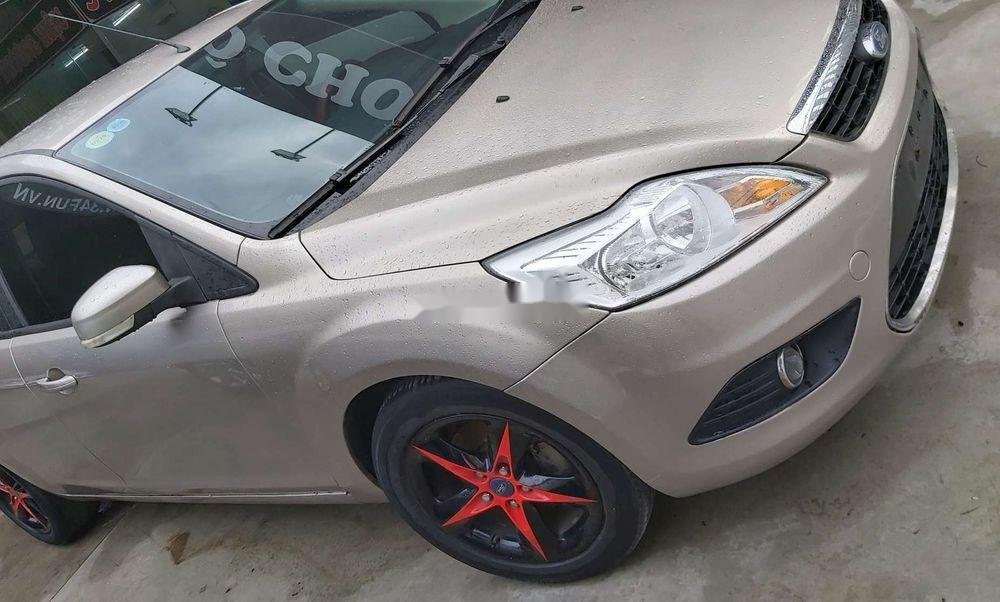 Ford Focus 2011 - Cần bán lại xe Ford Focus bản 1.8MT sx 2011, màu vàng, giá tốt