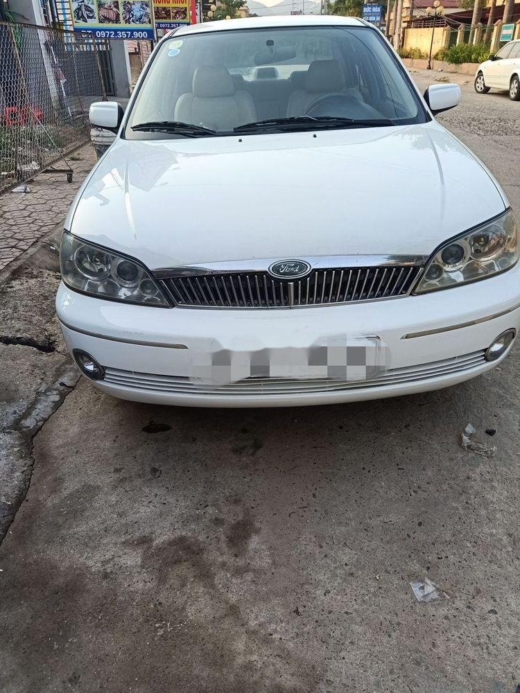 Ford Laser    2003 - Bán Ford Laser 2003, màu trắng còn mới