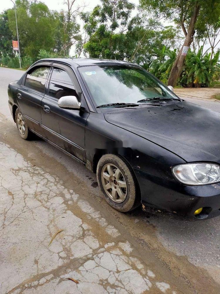Kia Spectra 2005 - Bán Kia Spectra đời 2005, màu đen, nhập khẩu nguyên chiếc chính hãng