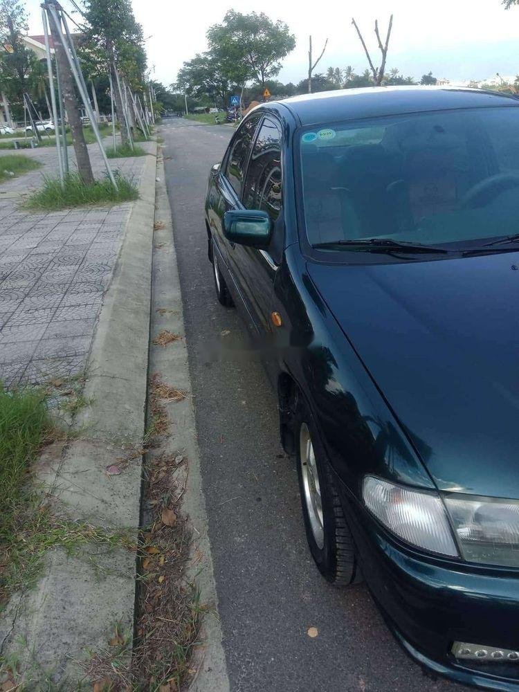 Mazda 323    1999 - Cần bán lại xe Mazda 323 sản xuất 1999, 95tr
