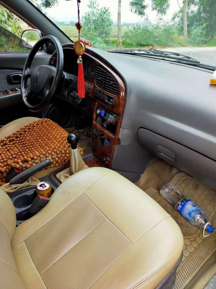 Kia Spectra 2005 - Bán Kia Spectra đời 2005, màu đen, nhập khẩu nguyên chiếc chính hãng