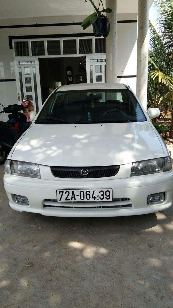 Mazda 323 2001 - Bán Mazda 323 sản xuất 2001, màu trắng xe gia đình