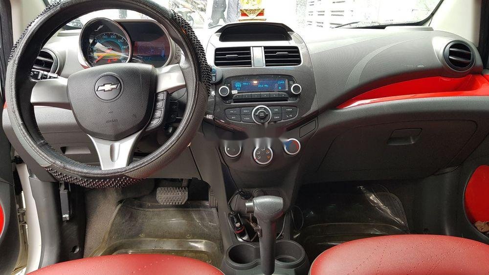 Chevrolet Spark AT 2014 - Cần bán gấp Chevrolet Spark AT năm 2014, màu trắng