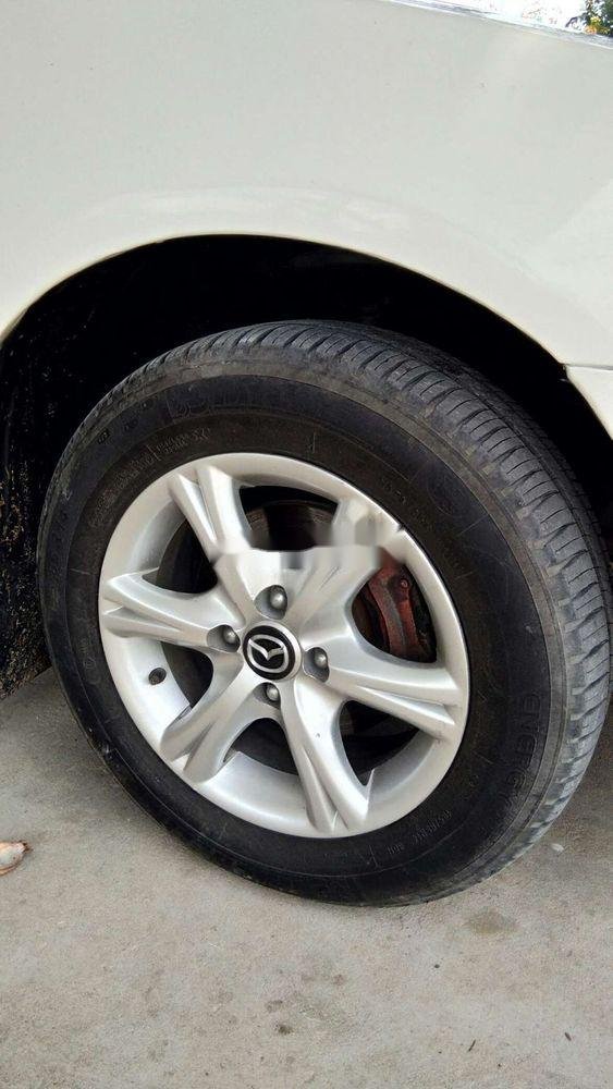 Mazda 323 2001 - Bán Mazda 323 sản xuất 2001, màu trắng xe gia đình