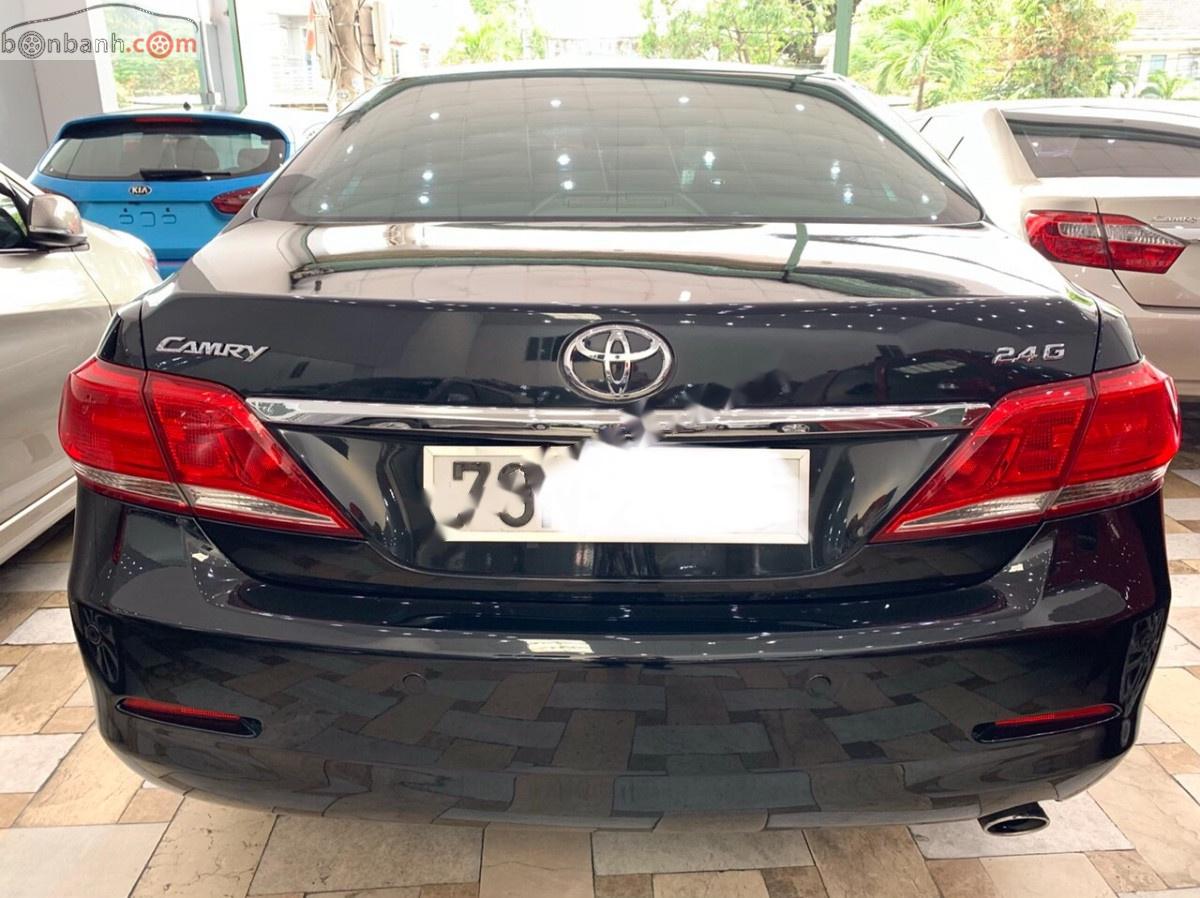 Toyota Camry 2.4G 2010 - Cần bán Toyota Camry 2.4G năm 2010, màu đen xe gia đình