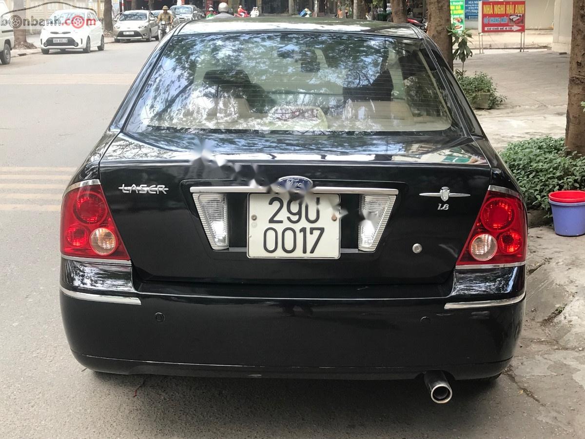 Ford Laser AT 2004 - Bán Ford Laser AT năm sản xuất 2004, màu đen, nhập khẩu xe gia đình 