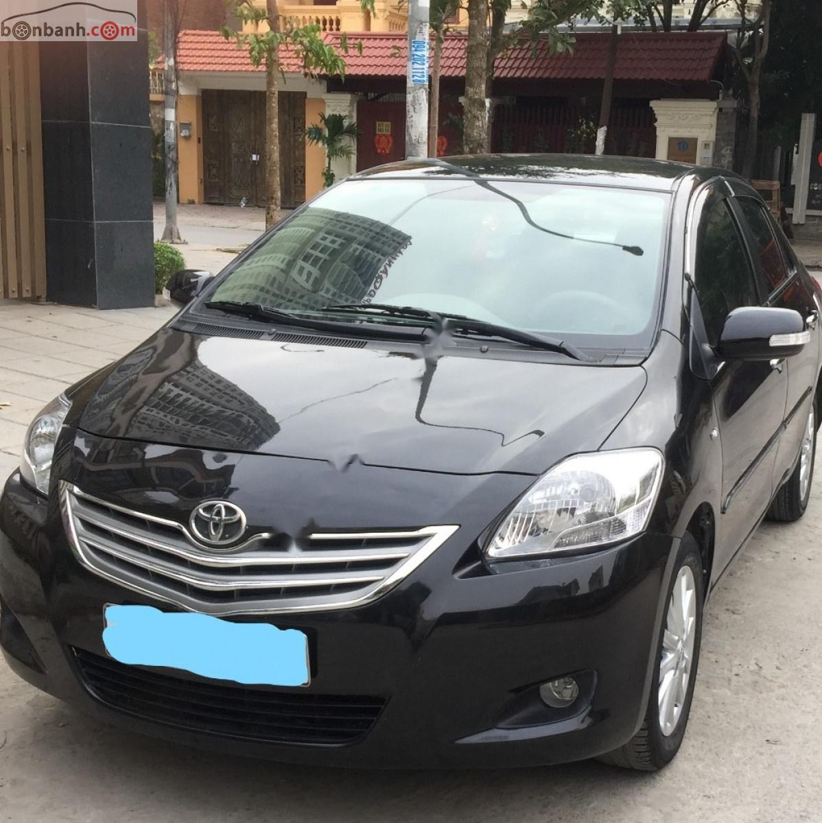 Toyota Vios  E 2011 - Bán ô tô Toyota Vios E sản xuất năm 2011, màu đen xe gia đình, giá tốt