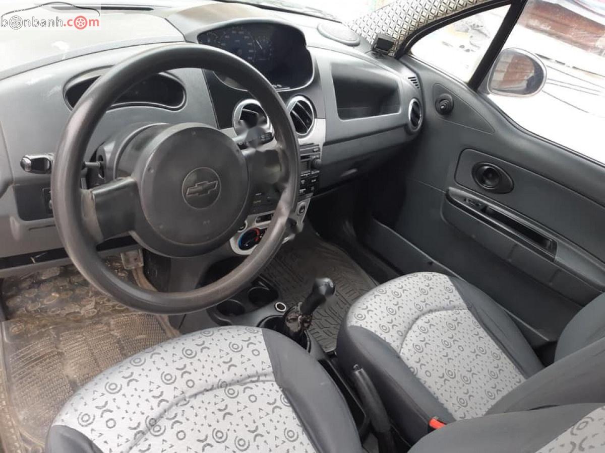 Chevrolet Spark 2010 - Cần bán Chevrolet Spark 2010, màu bạc xe gia đình