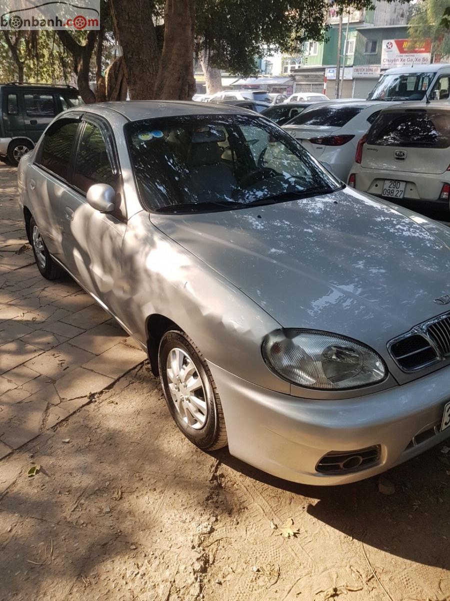 Daewoo Lanos SX 2004 - Cần bán xe Daewoo Lanos SX sản xuất 2004, màu bạc chính chủ giá cạnh tranh