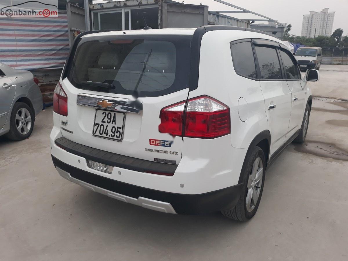 Chevrolet Orlando LTZ 1.8 AT 2013 - Bán ô tô Chevrolet Orlando LTZ 1.8 AT sản xuất năm 2013, màu trắng chính chủ, giá tốt