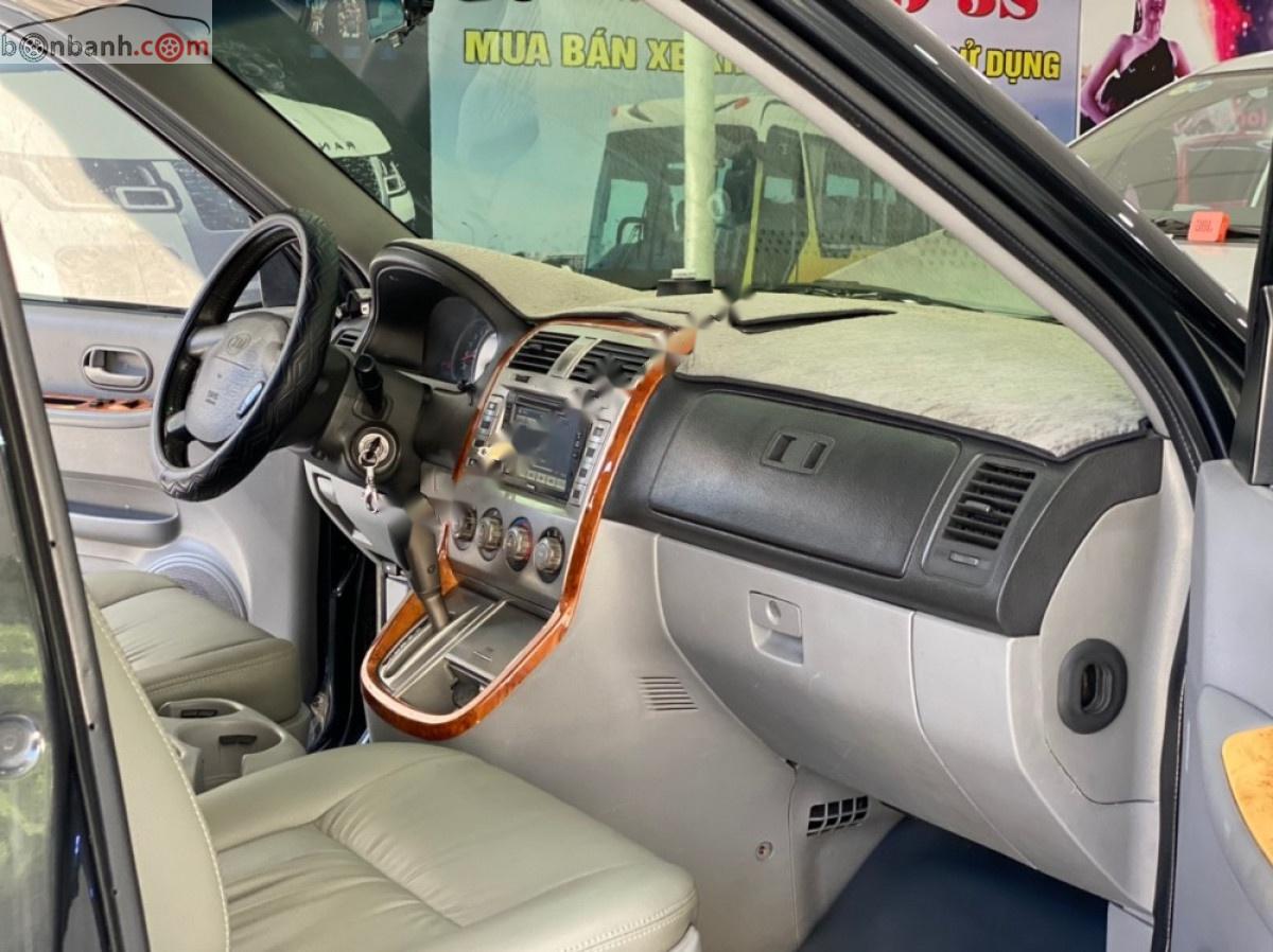 Kia Carnival 2008 - Bán ô tô Kia Carnival GS 2.5 AT sản xuất 2008, màu đen số tự động xe còn mới lắm