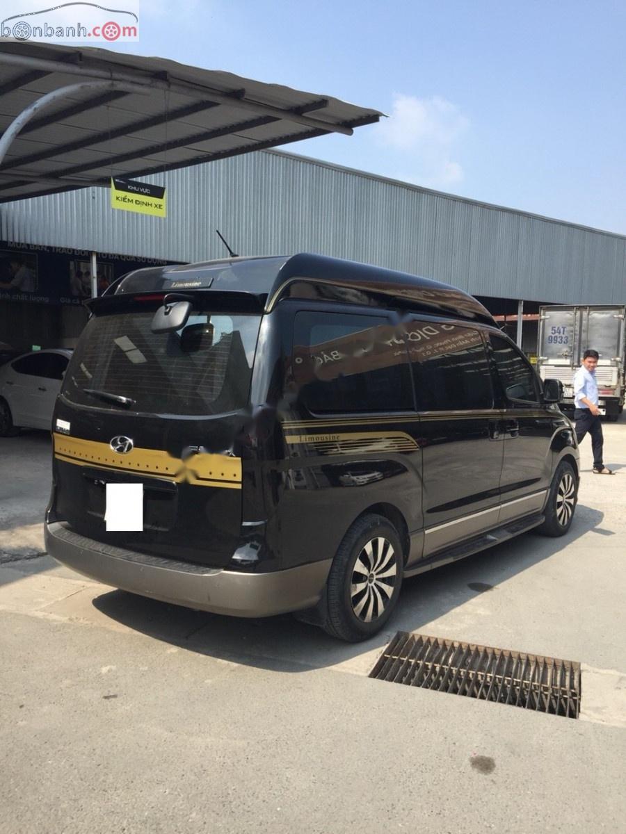 Hyundai Grand Starex   2014 - Cần bán lại xe Hyundai Grand Starex 2014, màu đen, nhập khẩu chính hãng