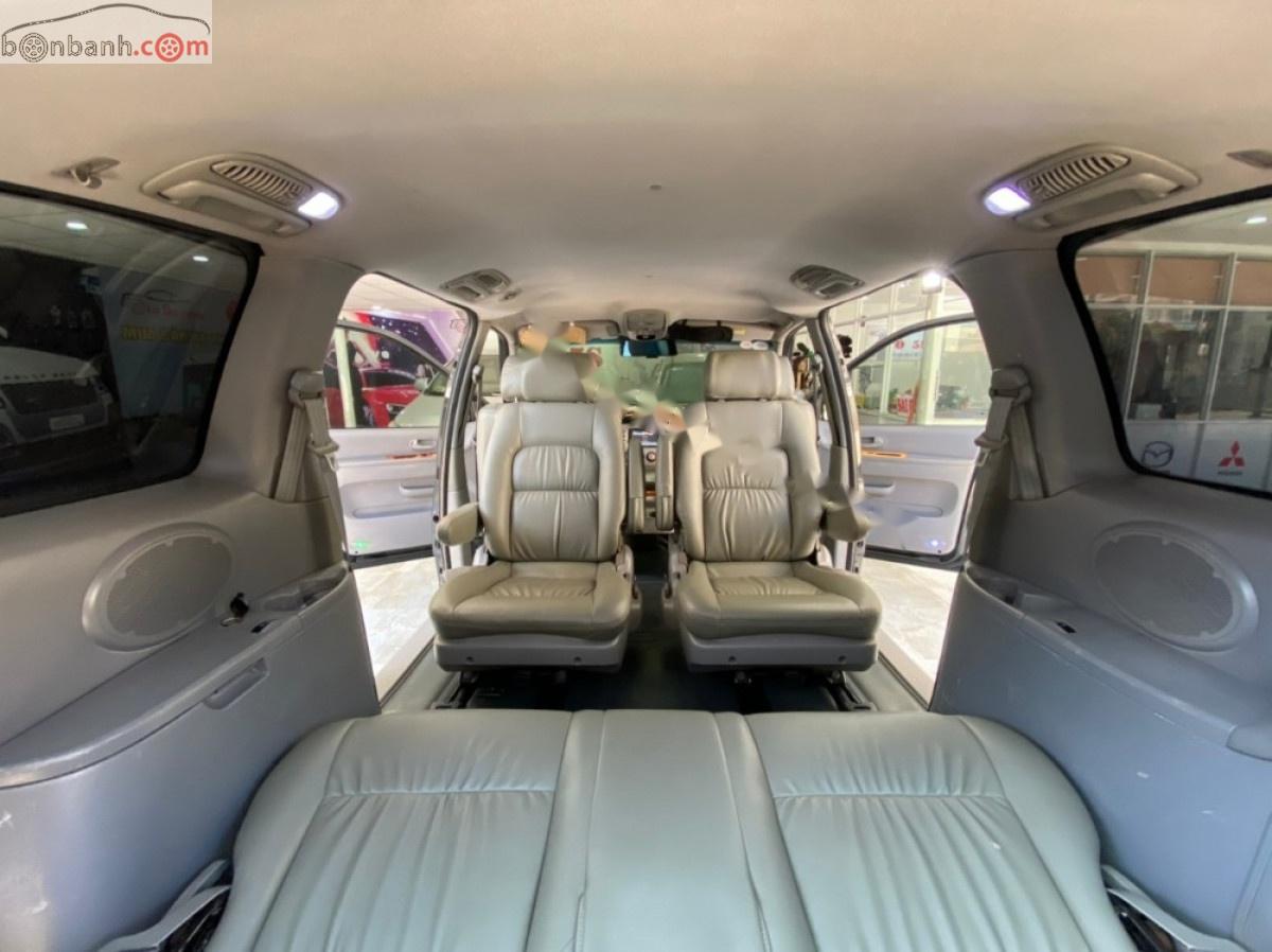 Kia Carnival 2008 - Bán ô tô Kia Carnival GS 2.5 AT sản xuất 2008, màu đen số tự động xe còn mới lắm