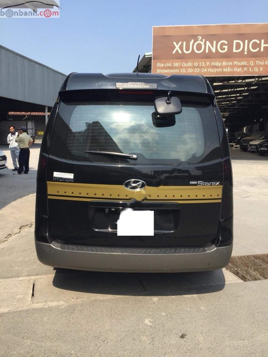 Hyundai Grand Starex   2014 - Cần bán lại xe Hyundai Grand Starex 2014, màu đen, nhập khẩu chính hãng