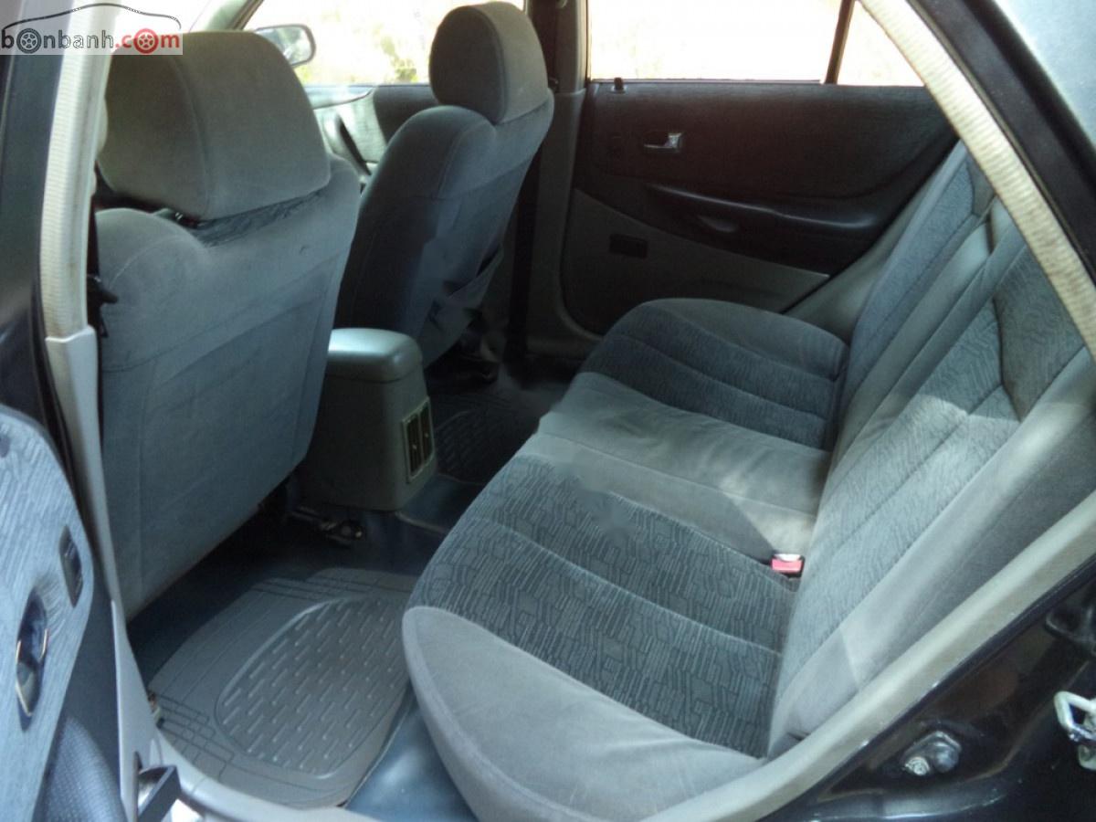 Ford Laser   2002 - Cần bán lại xe Ford Laser đời 2002, màu xám còn mới