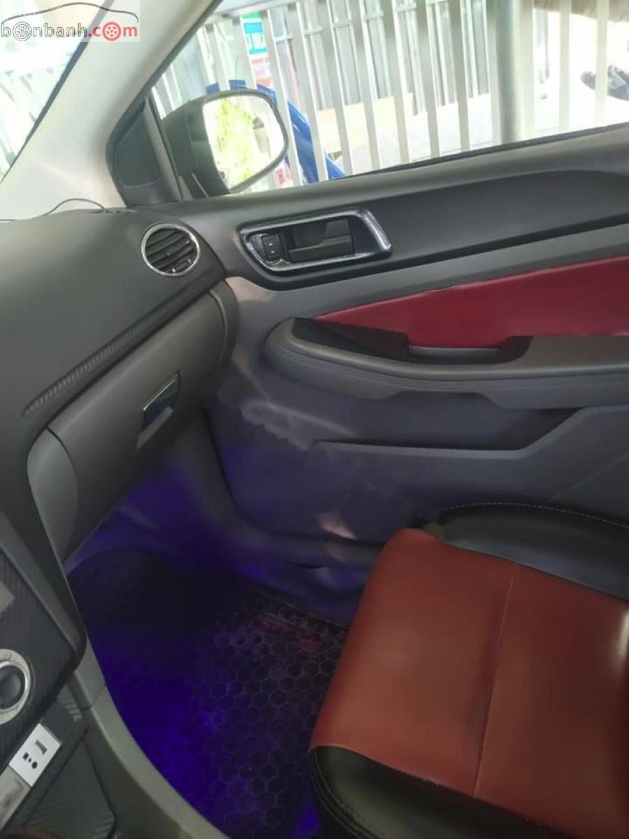 Ford Focus 1.8 AT 2011 - Bán Ford Focus 1.8 AT sản xuất 2011, màu đen số tự động, 320tr
