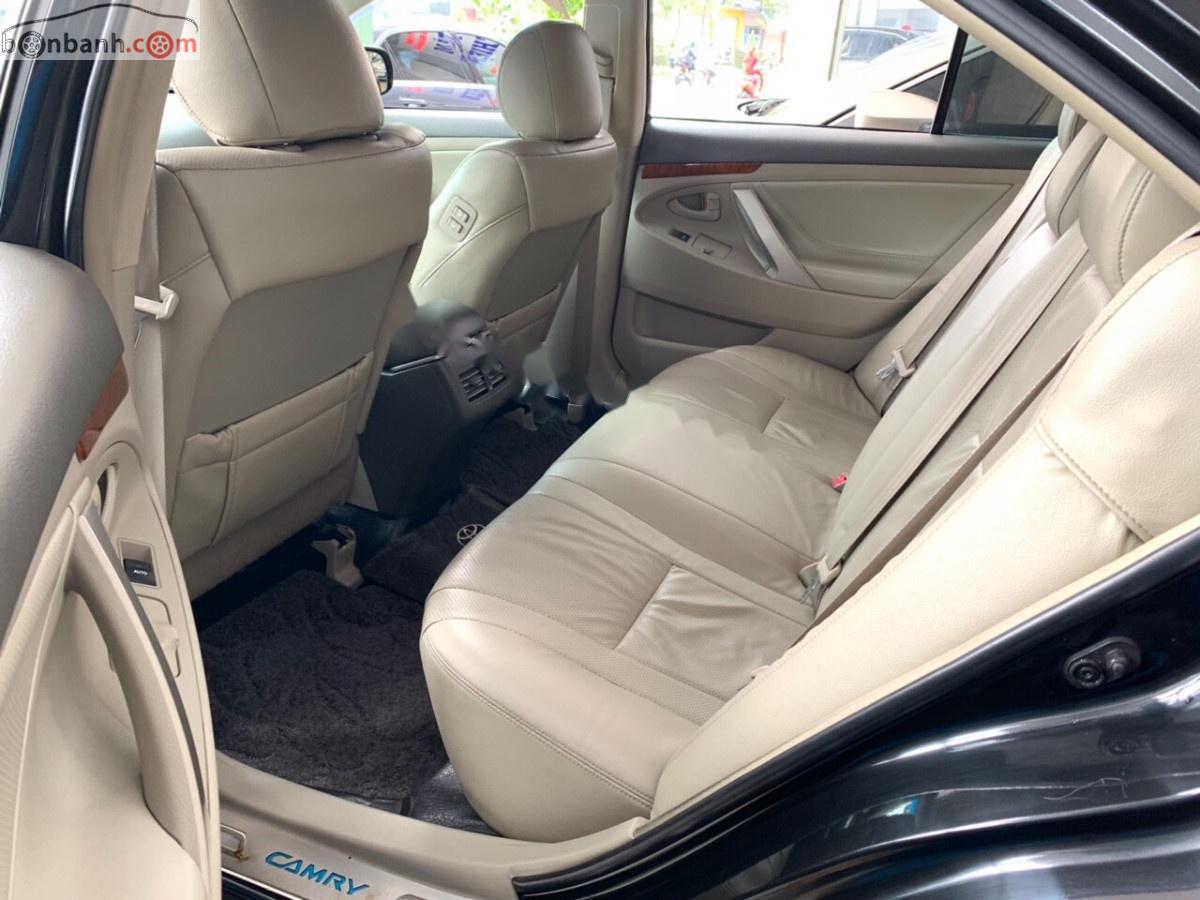 Toyota Camry 2.4G 2010 - Cần bán Toyota Camry 2.4G năm 2010, màu đen xe gia đình