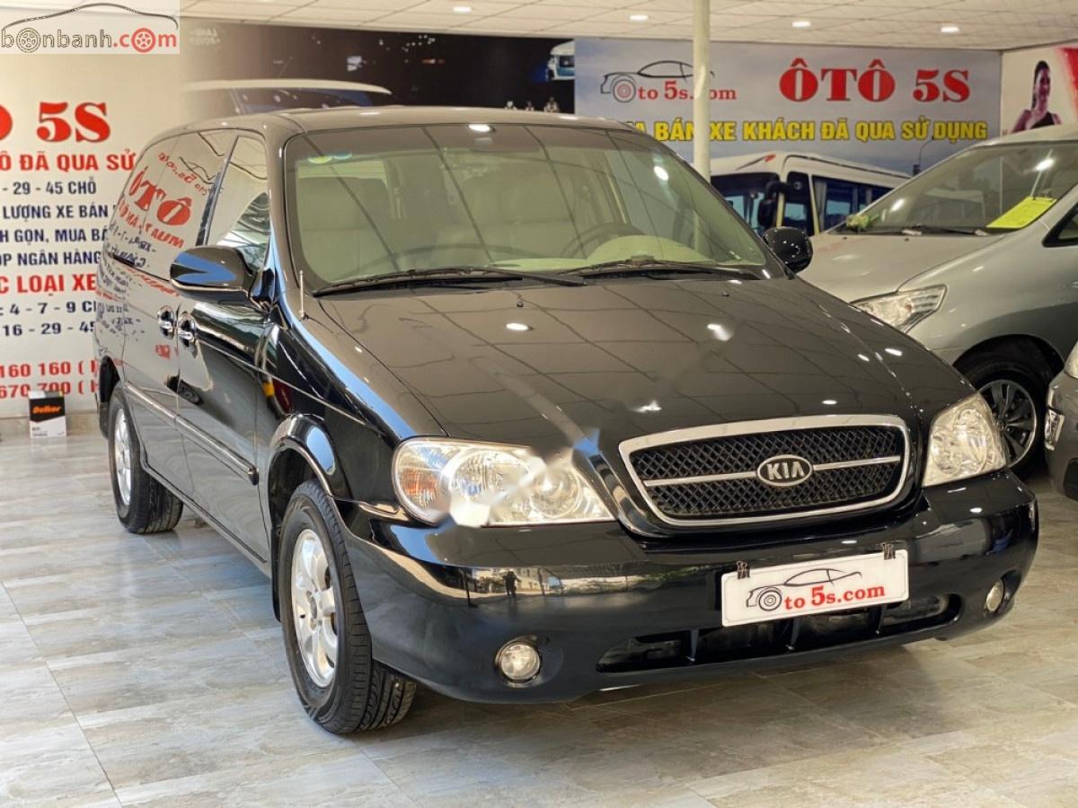 Kia Carnival 2008 - Bán ô tô Kia Carnival GS 2.5 AT sản xuất 2008, màu đen số tự động xe còn mới lắm