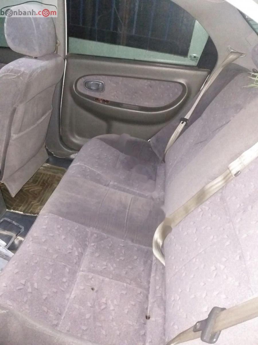 Kia Spectra   2005 - Bán Kia Spectra 1.6 MT năm sản xuất 2005, màu trắng, số sàn