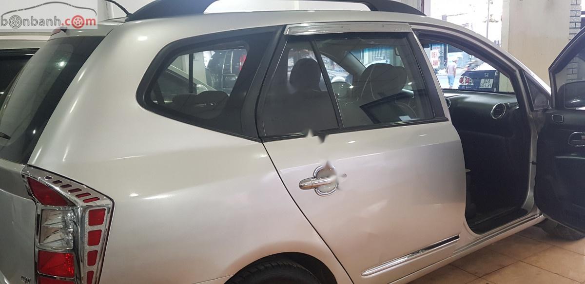 Kia Carens Ex 2010 - Cần bán gấp Kia Carens Ex sản xuất 2010, màu bạc số tự động, 345 triệu