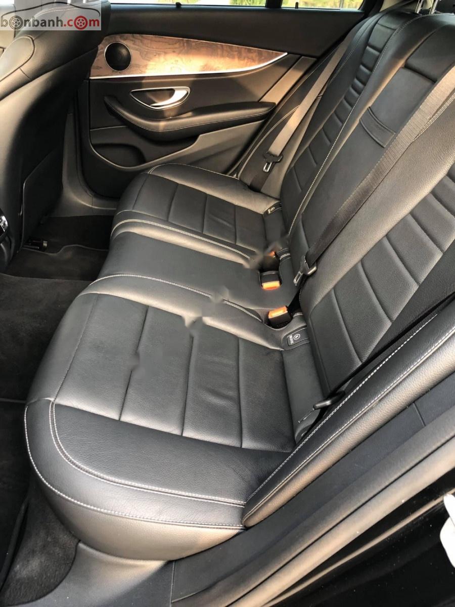 Mercedes-Benz E class 2016 - Cần bán Mercedes đời 2016, màu đen xe còn mới nguyên