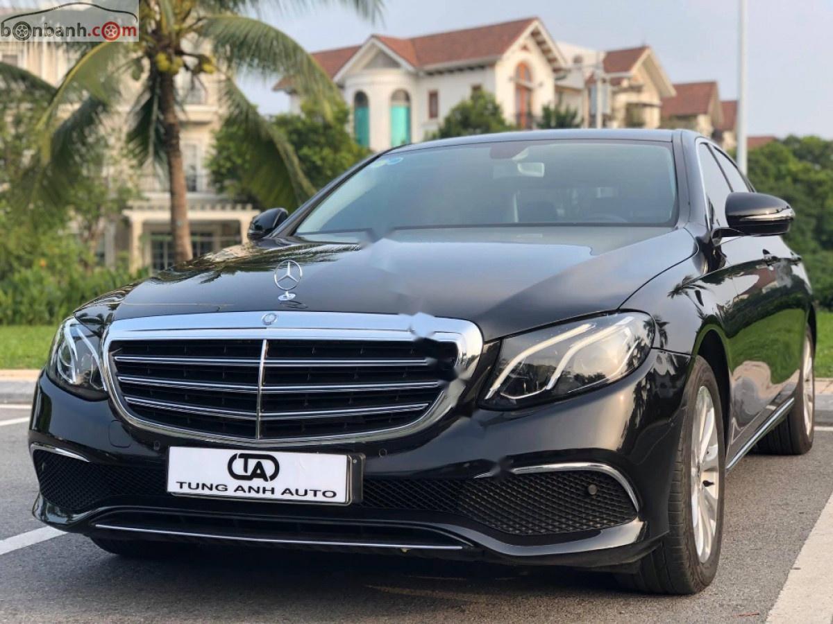Mercedes-Benz E class 2016 - Cần bán Mercedes đời 2016, màu đen xe còn mới nguyên