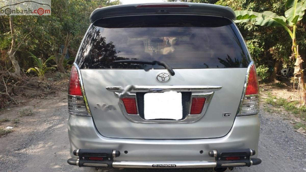 Toyota Hilux 2.0 G 2009 - Bán ô tô Toyota Hilux 2.0 G năm sản xuất 2009, màu bạc xe gia đình
