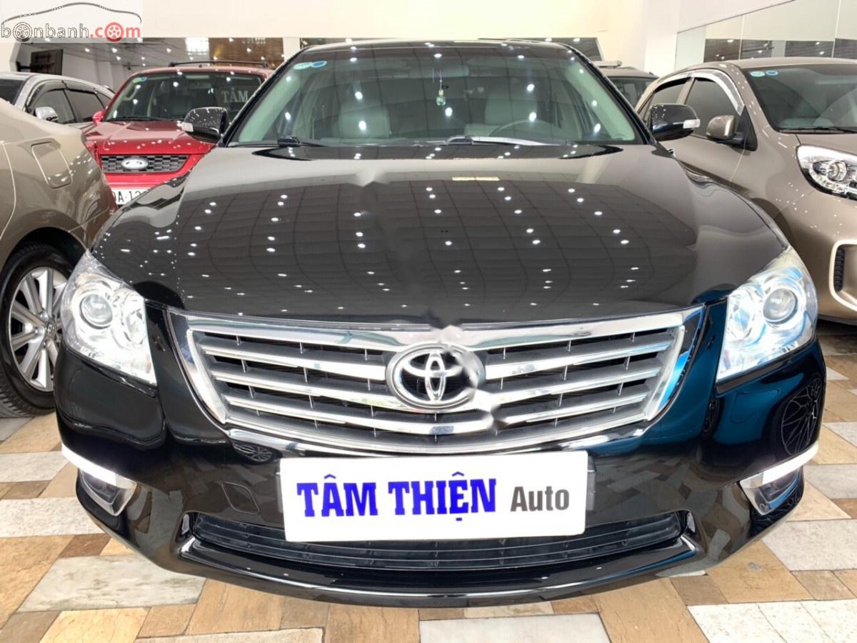 Toyota Camry 2.4G 2010 - Cần bán Toyota Camry 2.4G năm 2010, màu đen xe gia đình