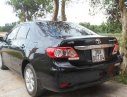 Toyota Corolla 2011 - Cần bán xe Toyota Corolla đời 2011, màu đen đã đi 15000 km, 670 triệu