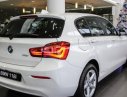 BMW 1 Series 118i 2016 - Bán BMW 118i sản xuất 2016, màu trắng, xe nhập