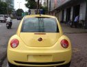 Volkswagen Beetle  AT 2009 - Cần bán lại xe Volkswagen Beetle AT 2009, màu vàng, xe nhập số tự động