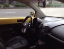 Volkswagen Beetle  AT 2009 - Cần bán lại xe Volkswagen Beetle AT 2009, màu vàng, xe nhập số tự động