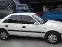Mazda 323 1989 - Cần bán Mazda 323 đời 1989, màu trắng, giá 58tr