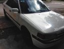 Mazda 323 1995 - Cần bán gấp Mazda 323 sản xuất 1995, màu trắng 