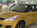 Suzuki Swift 2016 - Cần bán xe Suzuki Swift đời 2016, màu vàng, 609 triệu