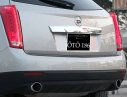 Cadillac SRX 2009 - Xe Cadillac SRX 4 đời 2009, màu vàng, nhập khẩu chính hãng