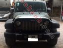 Jeep Wrangler Unlimited Sport 2010 - Cần bán gấp Jeep Wrangler Unlimited Sport 2010, màu đen, xe nhập chính chủ