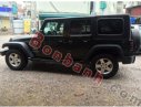 Jeep Wrangler Unlimited Sport 2010 - Cần bán gấp Jeep Wrangler Unlimited Sport 2010, màu đen, xe nhập chính chủ