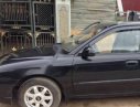 Kia Spectra 2005 - Bán Kia Spectra đời 2005, màu đen còn mới giá cạnh tranh