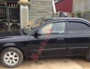 Kia Spectra 2005 - Bán Kia Spectra đời 2005, màu đen còn mới giá cạnh tranh