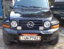 Ssangyong Korando 2004 - Cần bán xe Ssangyong Korando năm 2004, màu đen, nhập khẩu nguyên chiếc