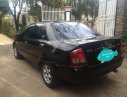 Mazda 323F 1.6 MT 2004 - Em cần bán xe Mazda 323F 1.6 MT sản xuất 2004, màu đen xe gia đình