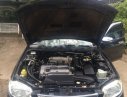 Mazda 323F 1.6 MT 2004 - Em cần bán xe Mazda 323F 1.6 MT sản xuất 2004, màu đen xe gia đình